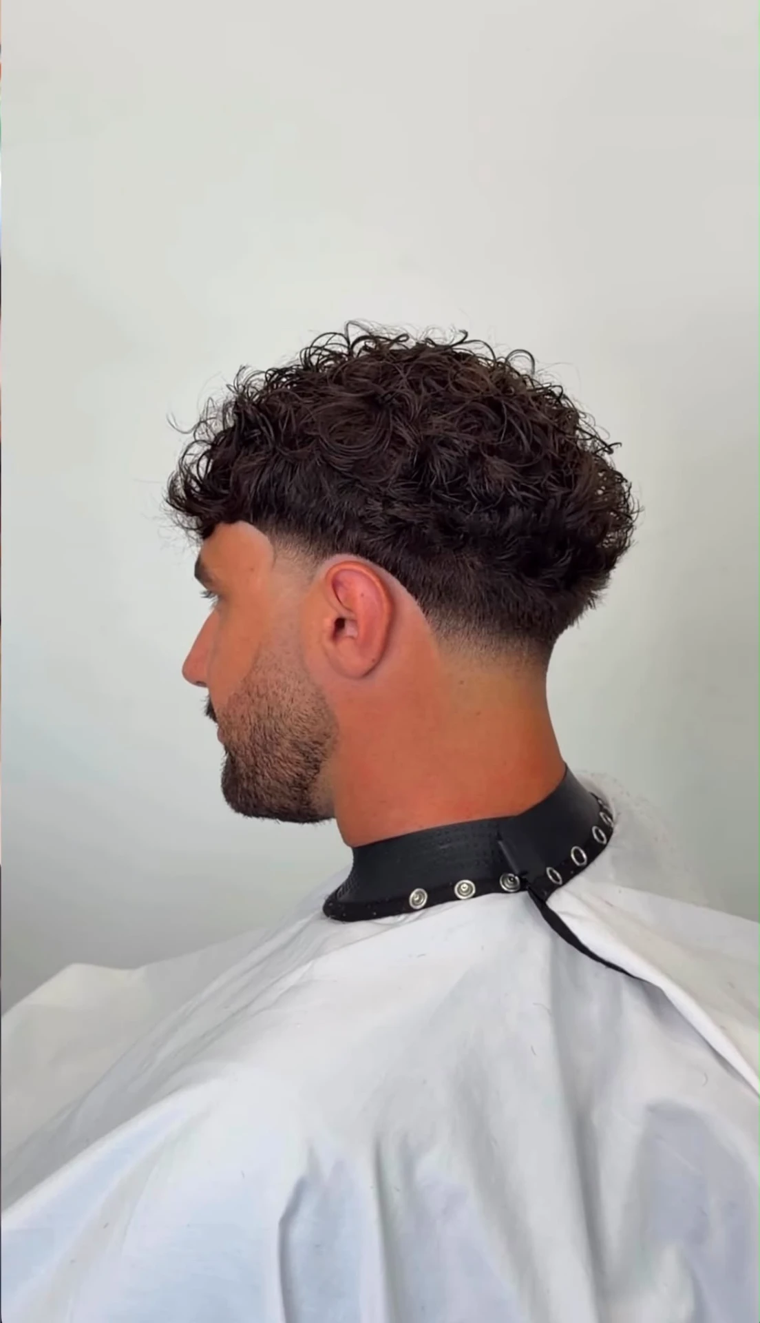 Curly top met taper fade